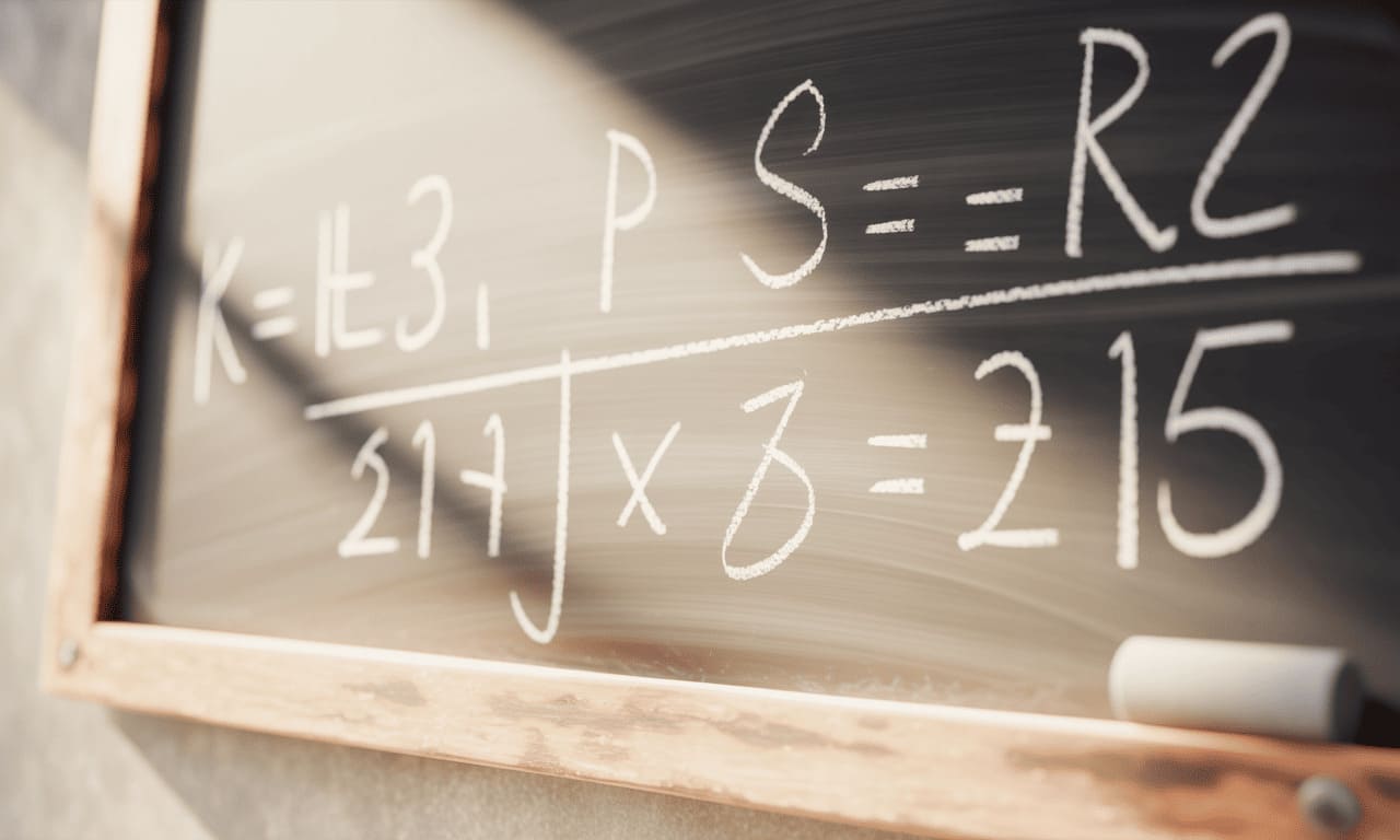mathematical formula on chalkboard finance concept