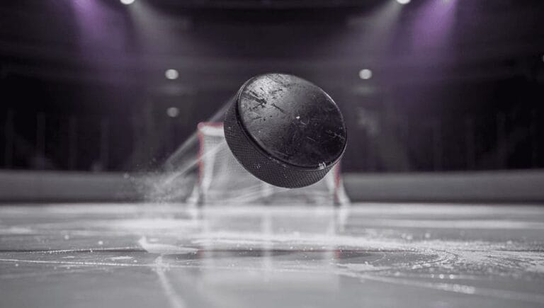 ice hockey puck shot on goal action