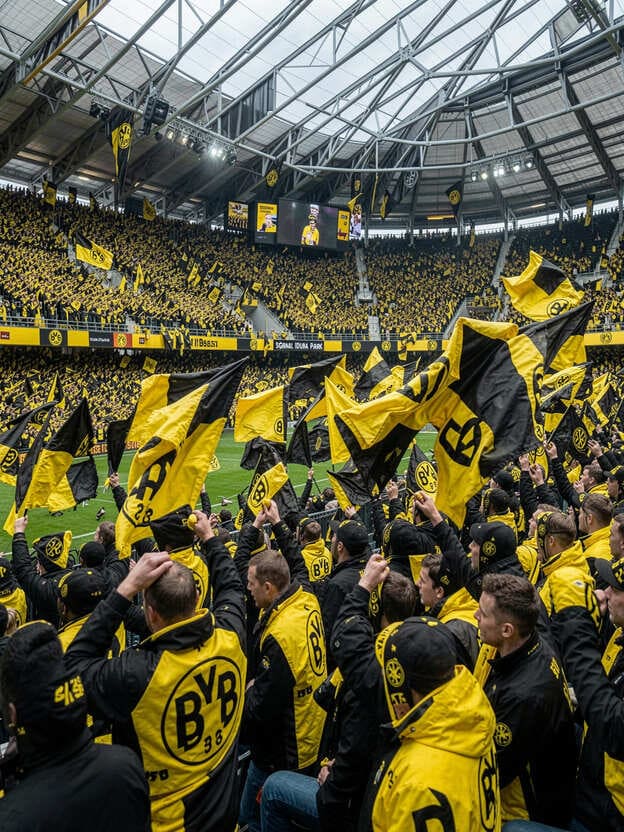 Borussia Dortmund fans yellow black stadium atmosphere Signal Iduna Park