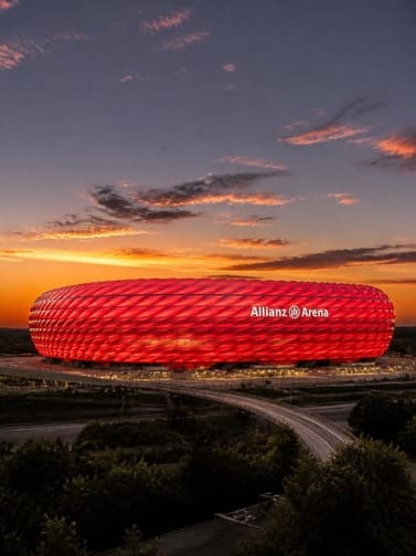 Bayern_Munich_Allianz_Arena_exterior_at_sunset_with_red_glow
